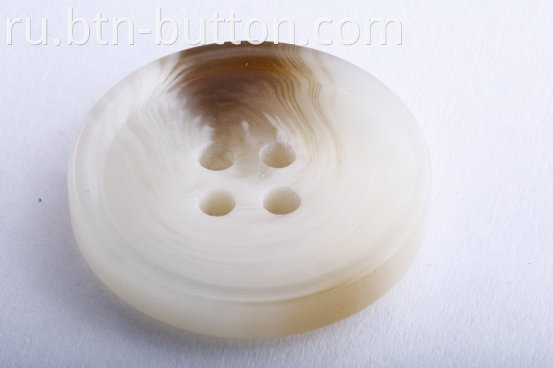 Imitation horn resin buttons for coats